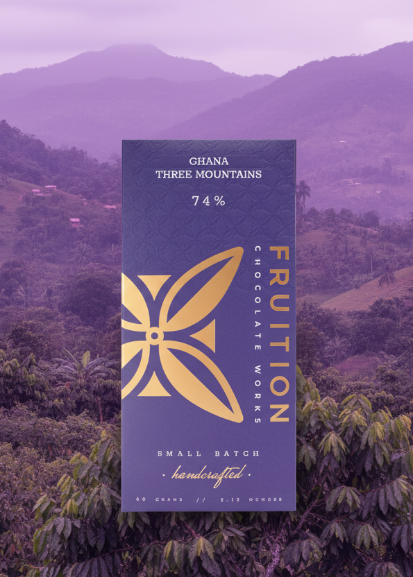 Chocolate bar packaging with 'Fruition Chocolate Works' branding on a purple background