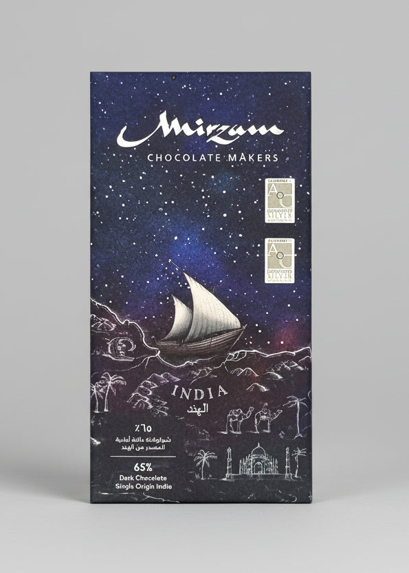 Chocolate packaging with ship and mountain design, featuring 'Mirzam Chocolate Makers' branding.