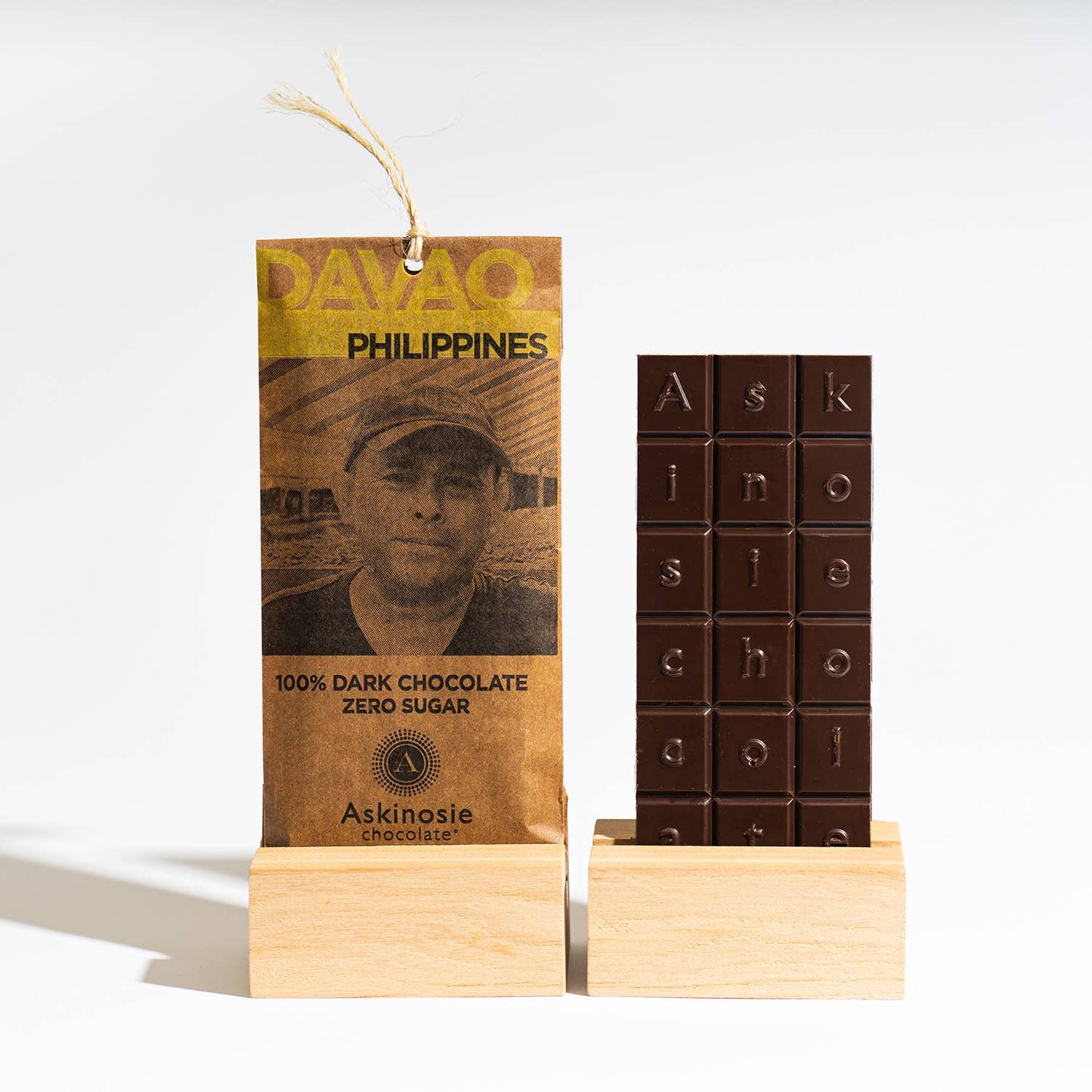 Askinosie chocolate bar with packaging featuring a person and 'Davao Philippines' text.
