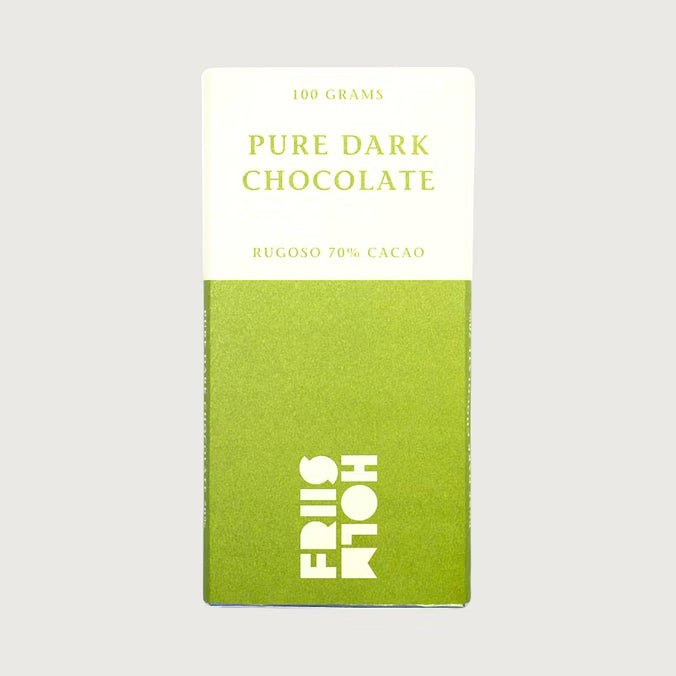 Green and white packaging of pure dark chocolate with text on a gray background