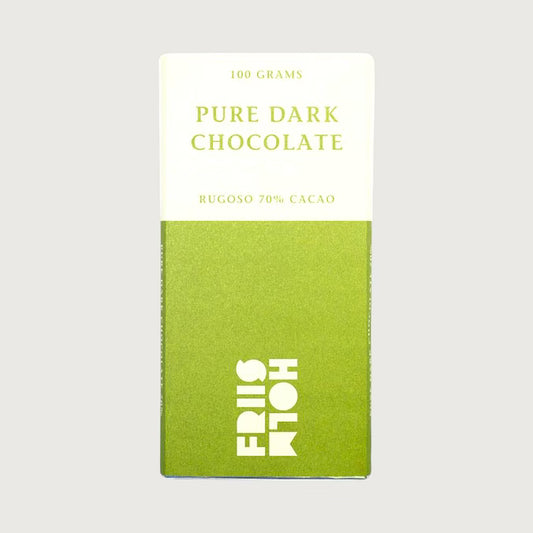 Green and white packaging of pure dark chocolate with text on a gray background